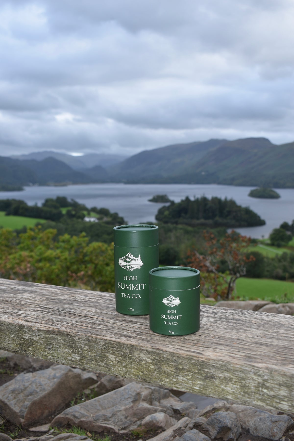 Two dark green tea tins from High Summit Tea Co.